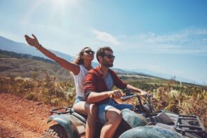 A woman and a man on ATV Rentals in New Mexico.