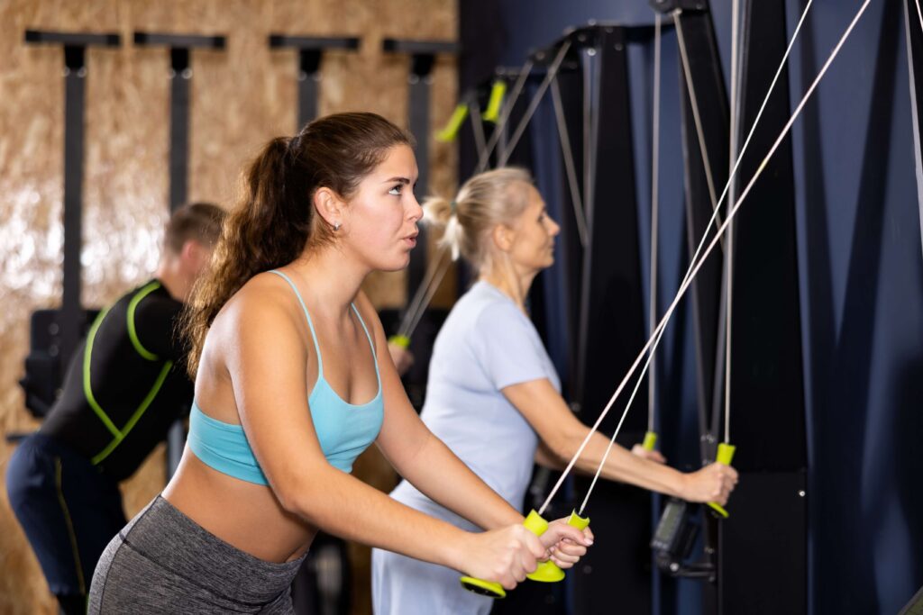 A woman doing skiing workouts.